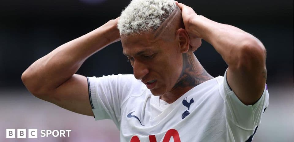 Player holding head in frustration during match