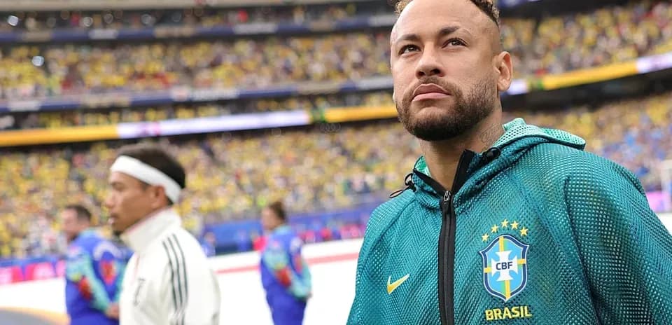 Neymar standing on field before match with crowd