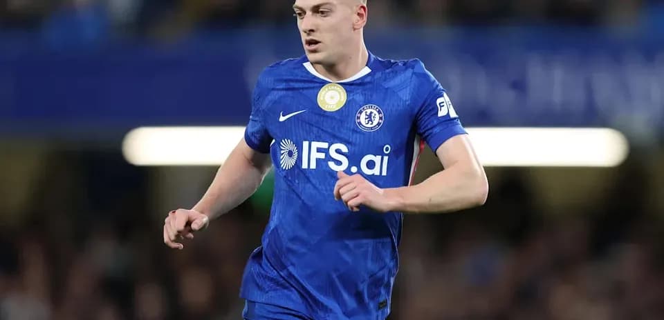 Chelsea player running on the pitch during match