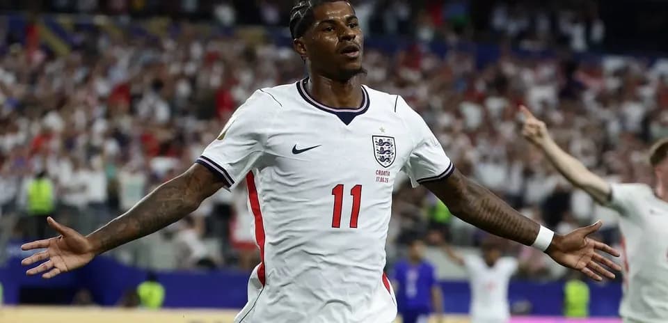 Player celebrating after scoring a goal for England