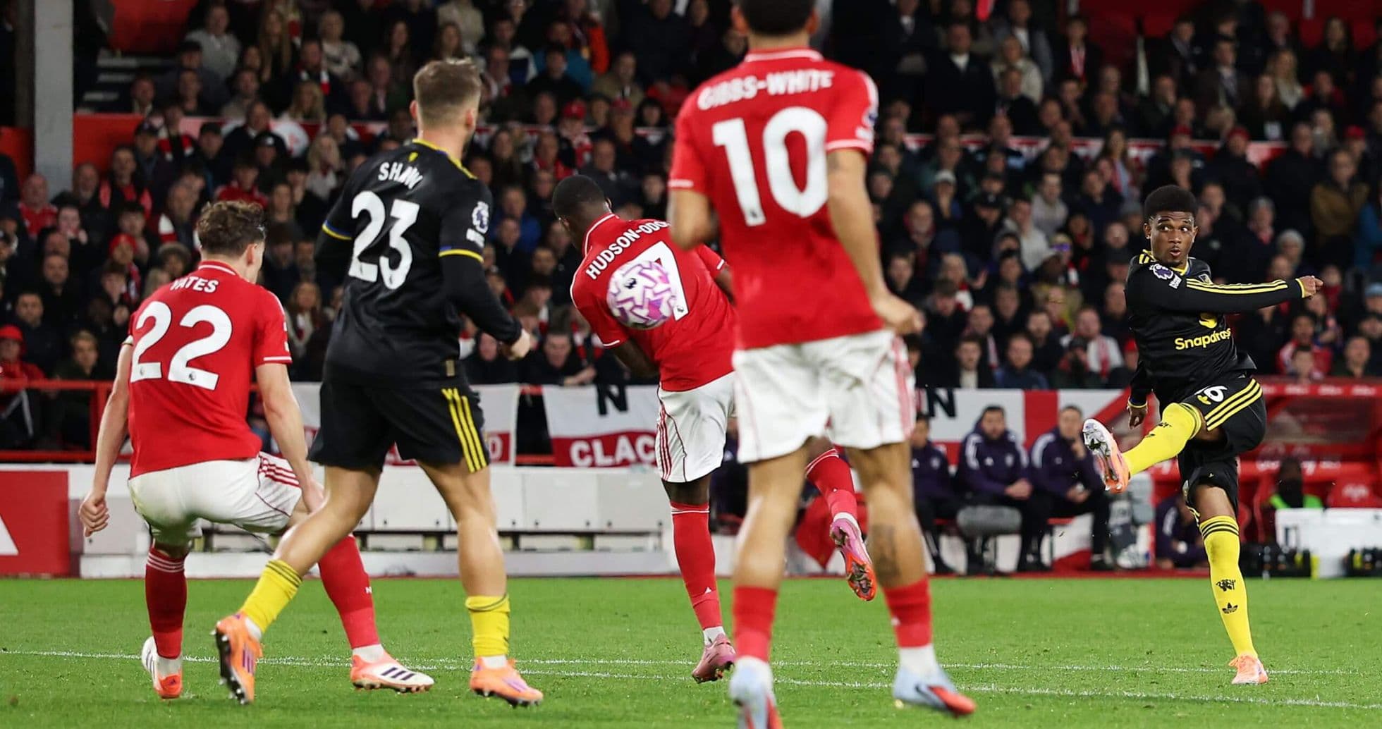 Player shooting during Manchester United match