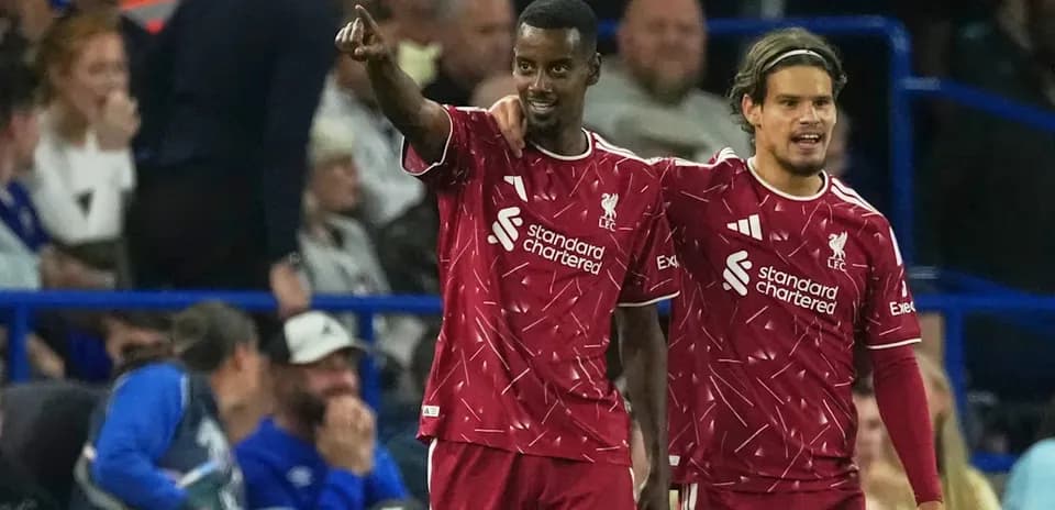 Liverpool players celebrating during a match