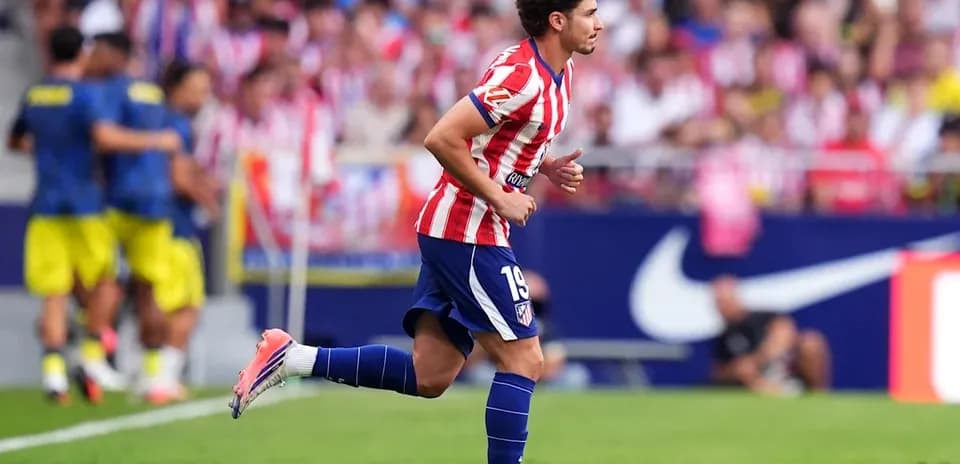 Player running during match at stadium