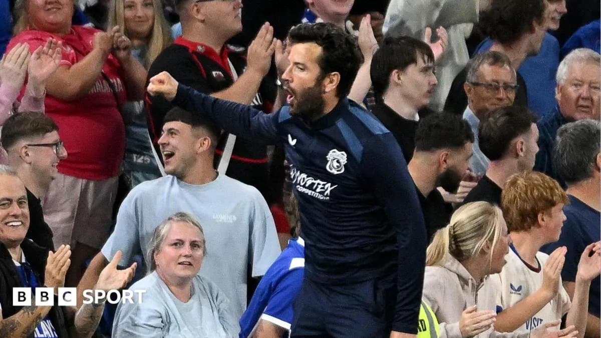 Player celebrating with fans in the stadium