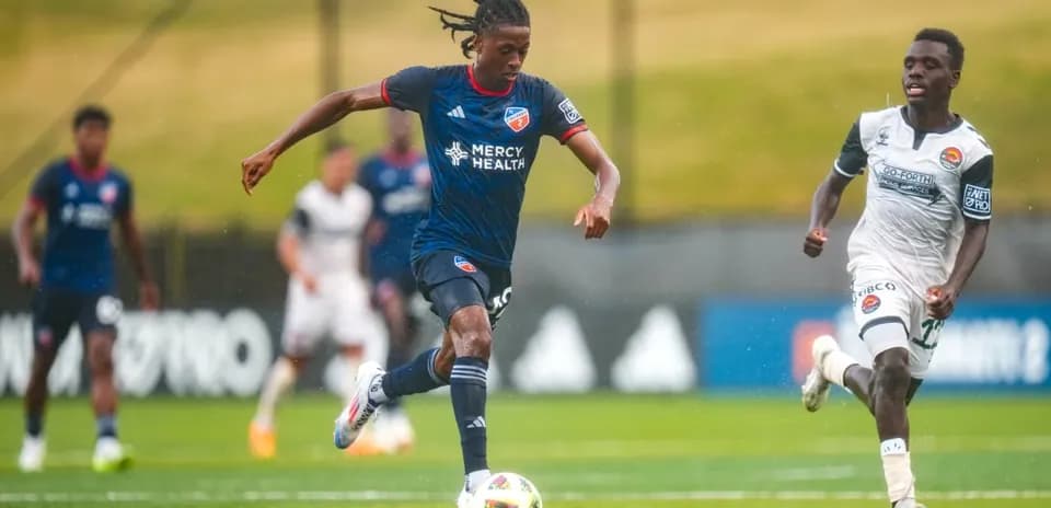 Player dribbling the ball during FC Cincinnati II match