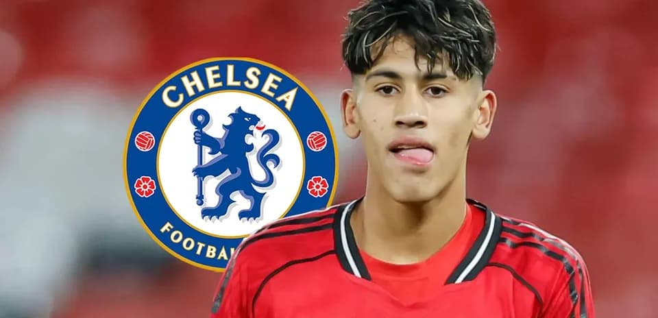 Young player in Manchester United kit with Chelsea logo