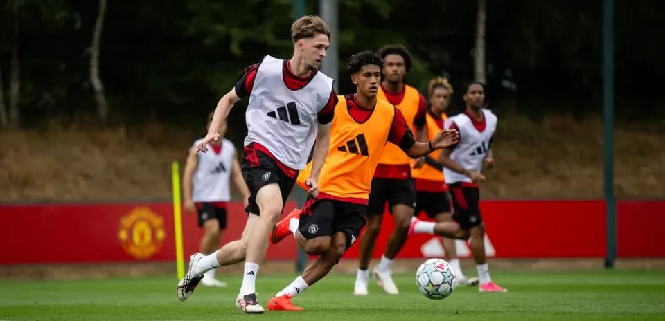 Players training on pitch during Manchester United session
