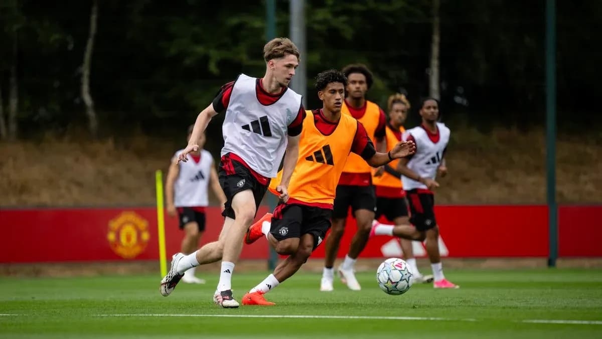 Players training on pitch during Manchester United session