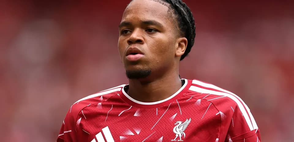 Player in red Liverpool jersey during match warm-up