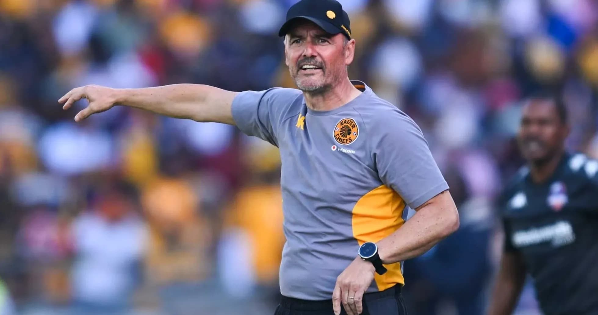 Kaiser Chiefs coach instructing players during match Kaiser Chiefs coach instructing players during match