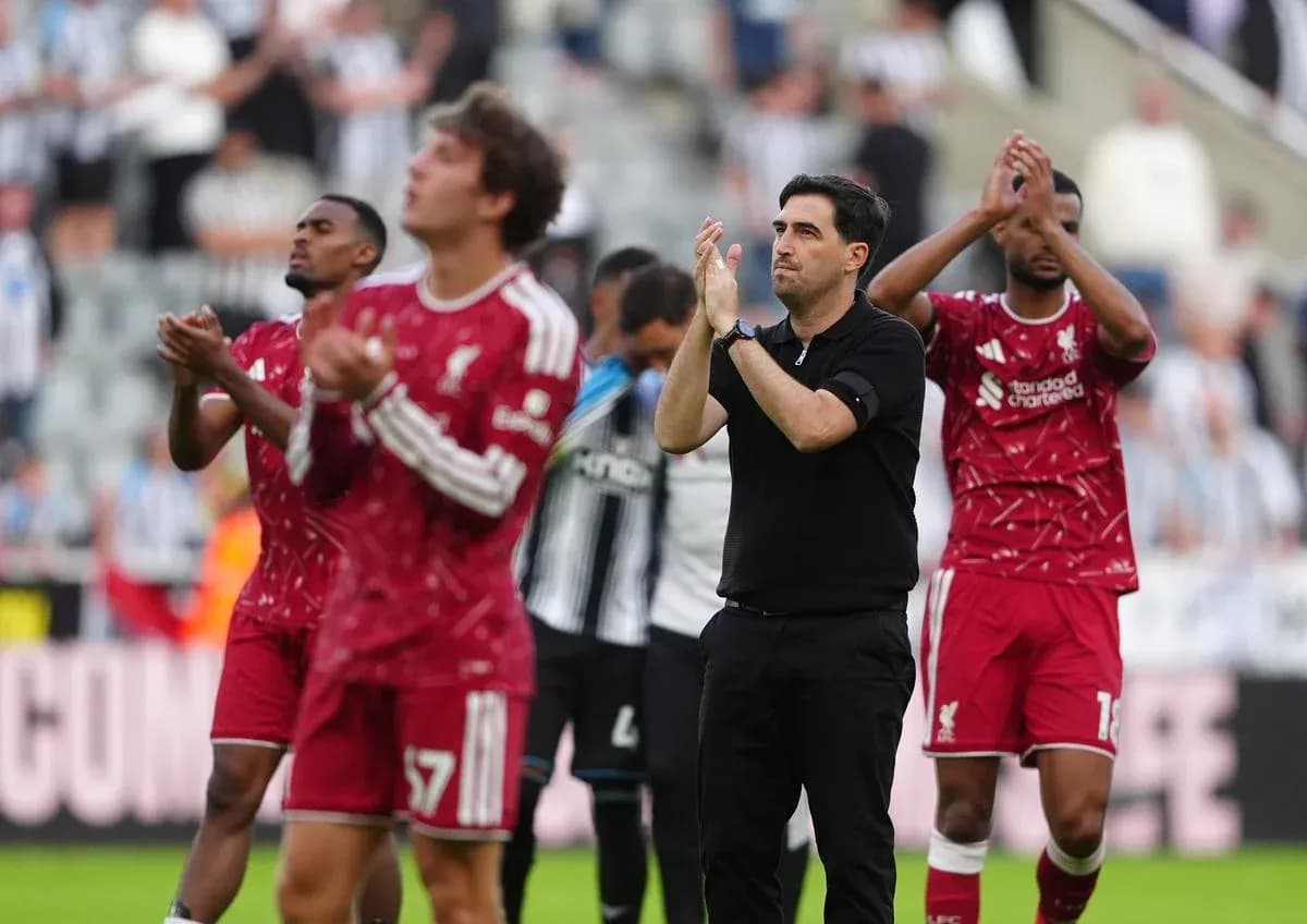 Liverpool players and manager applauding fans after match Liverpool players and manager applauding fans after match