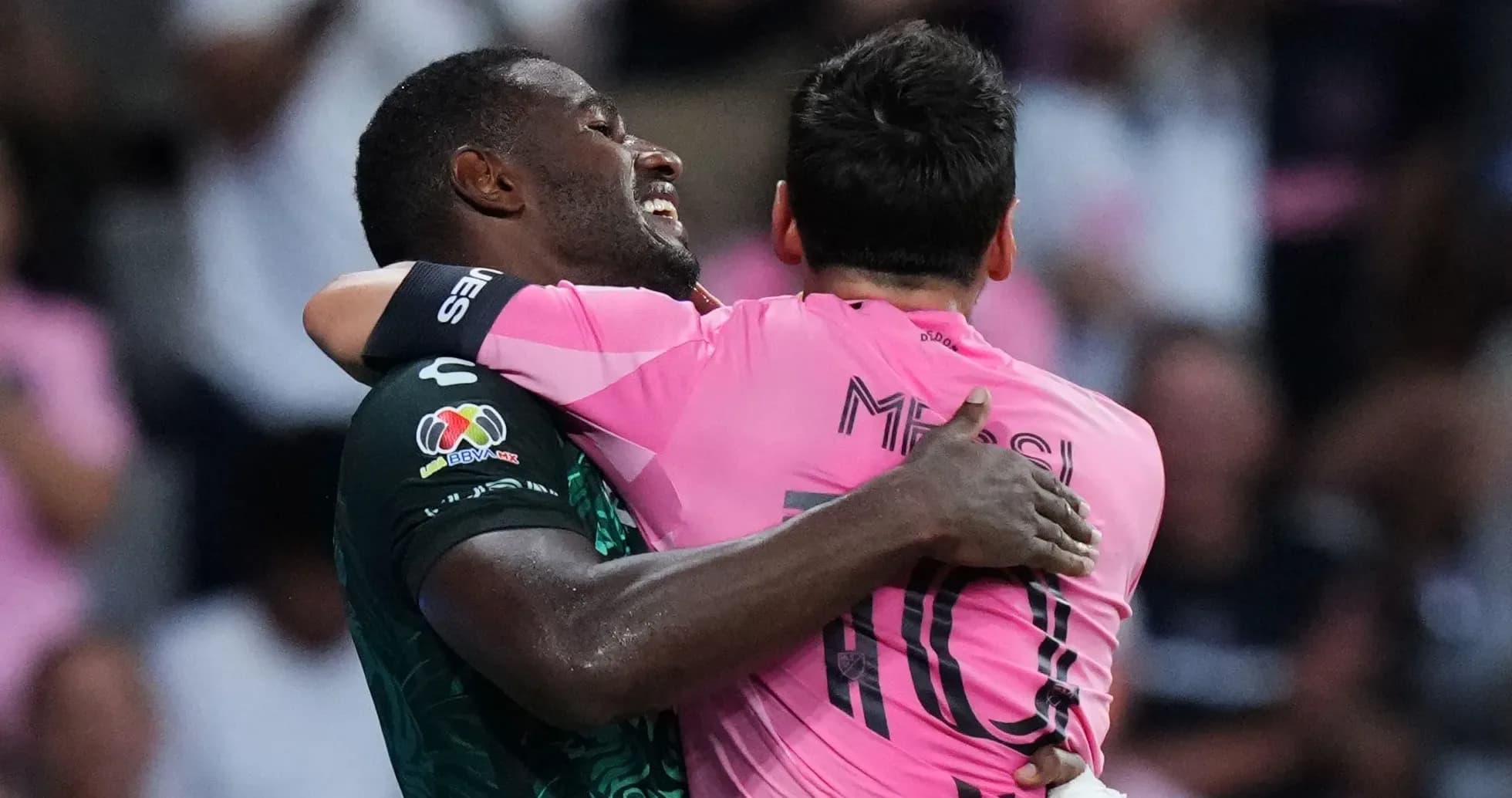 Two players embracing after a match celebration Two players embracing after a match celebration