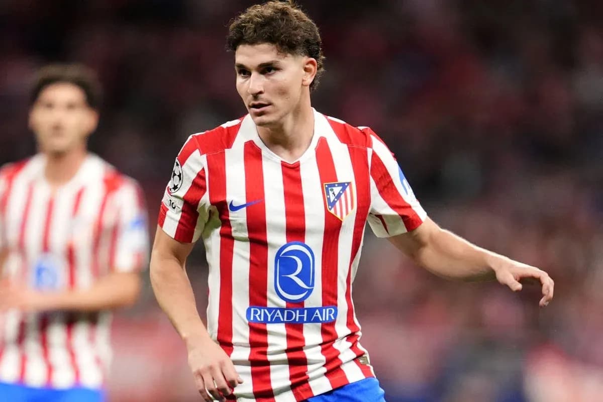 Atletico Madrid player in red and white kit Atletico Madrid player in red and white kit
