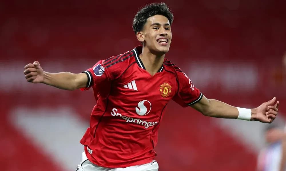 Player celebrating a goal in Manchester United jersey Player celebrating a goal in Manchester United jersey