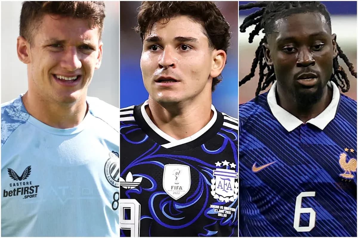 Three football players in their team jerseys Three football players in their team jerseys