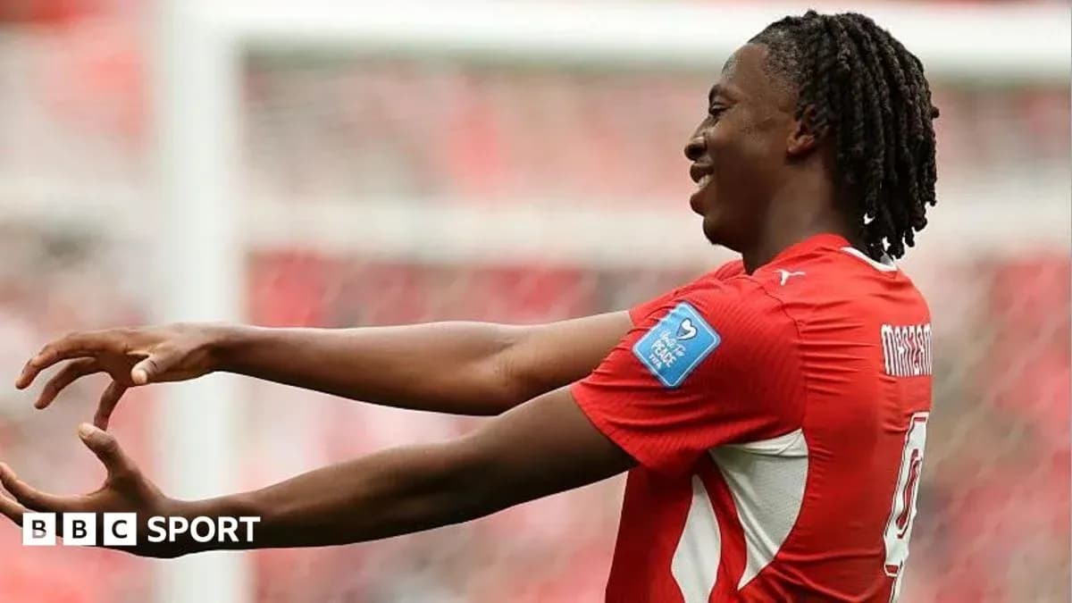 Player celebrating after scoring a goal in match Player celebrating after scoring a goal in match