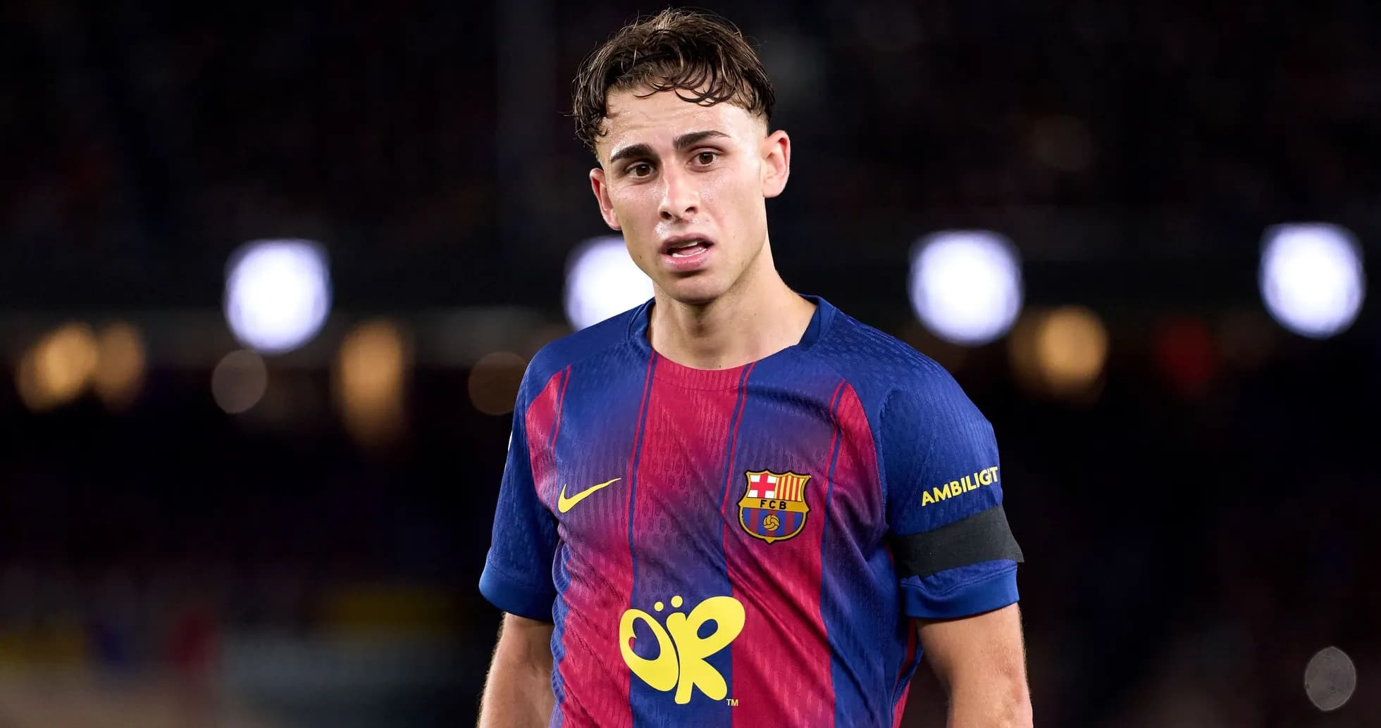Barcelona player wearing team jersey on the field Barcelona player wearing team jersey on the field