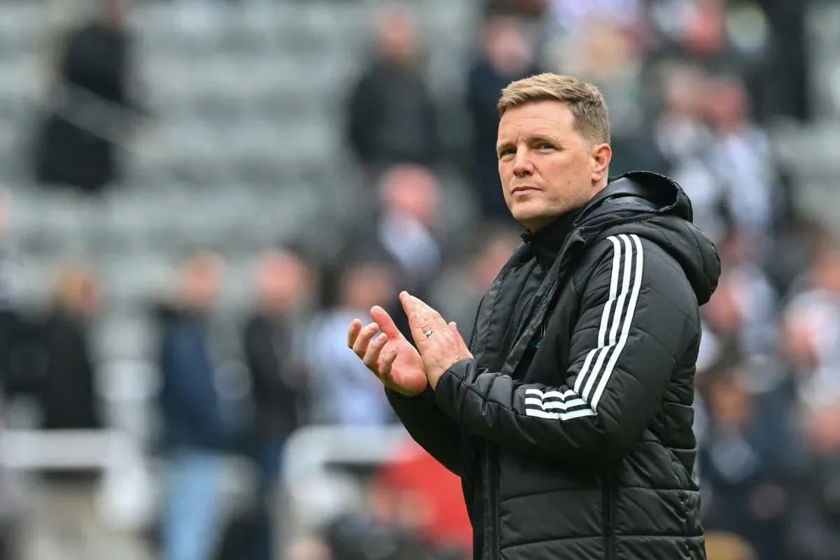 Manager applauding fans in stadium stands Manager applauding fans in stadium stands