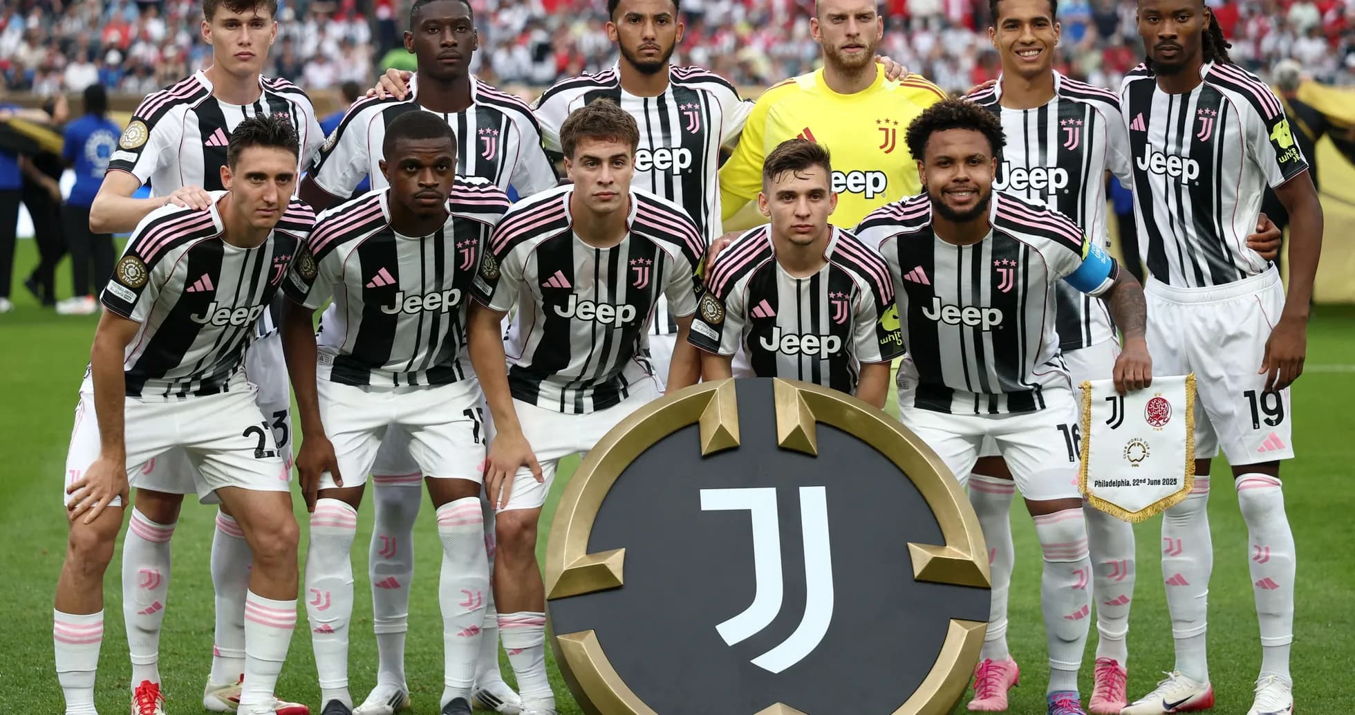 Juventus players posing with club emblem before match Juventus players posing with club emblem before match