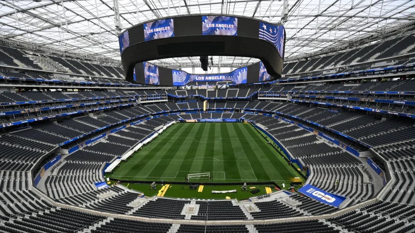 Empty stadium interior with soccer field view Empty stadium interior with soccer field view