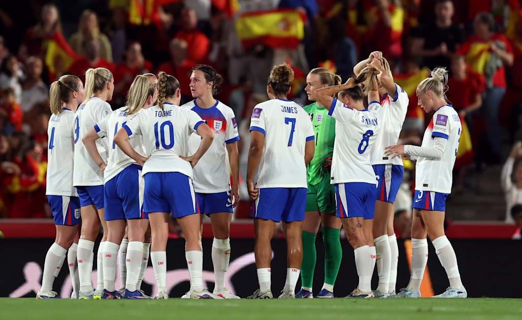 England women's team huddled during match England women's team huddled during match