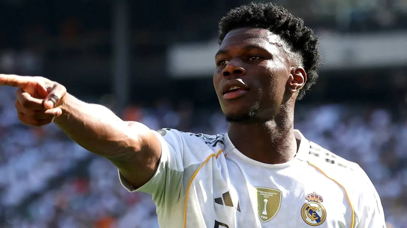 Player pointing during match in Real Madrid jersey Player pointing during match in Real Madrid jersey