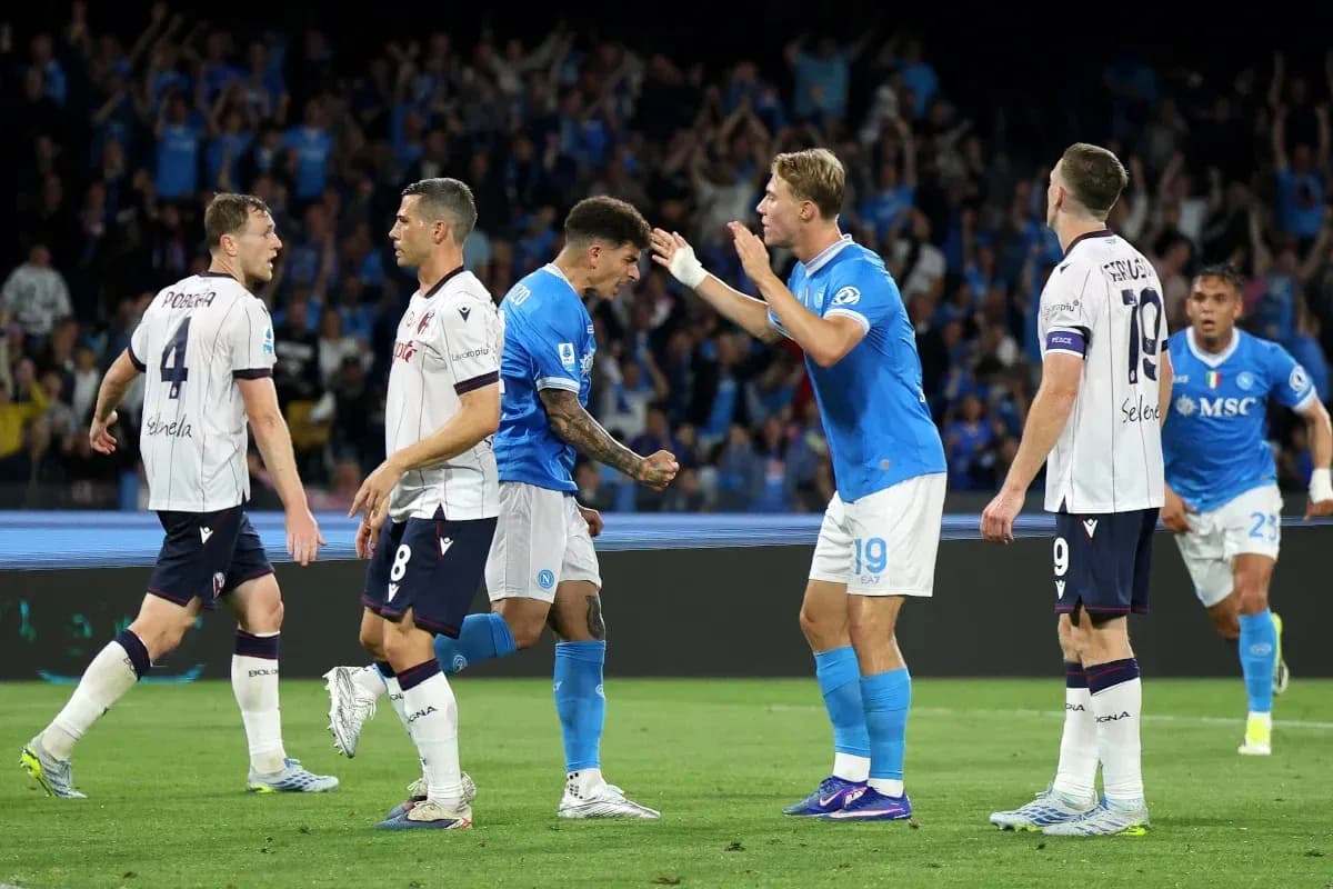 Napoli players celebrating a goal against Bologna Napoli players celebrating a goal against Bologna