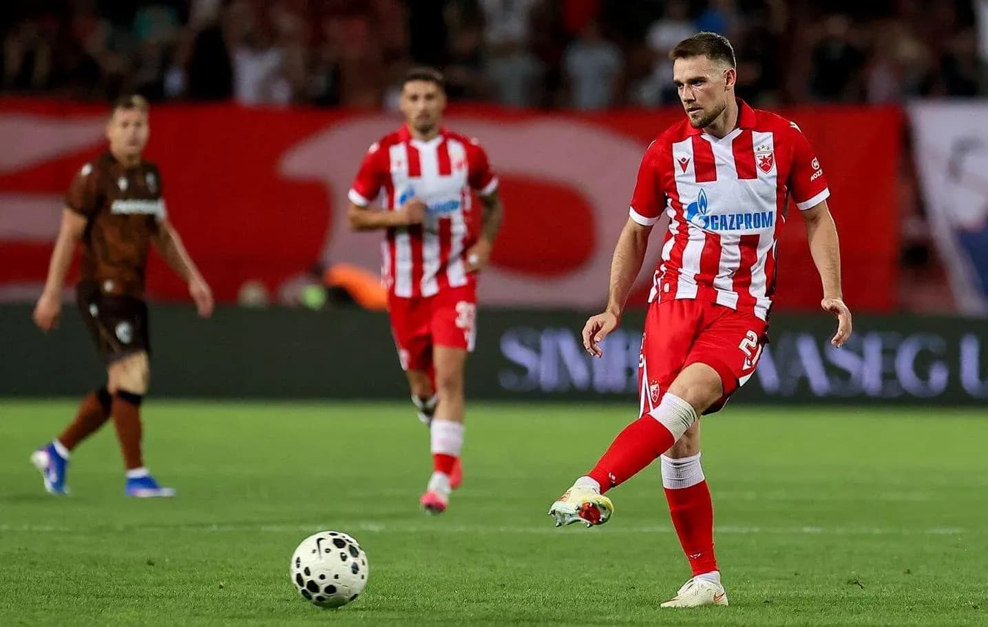 FK Crvena Zvezda player kicking the ball FK Crvena Zvezda player kicking the ball