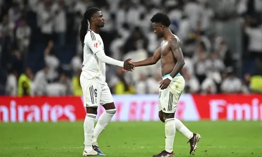 Two players shaking hands after the match Two players shaking hands after the match