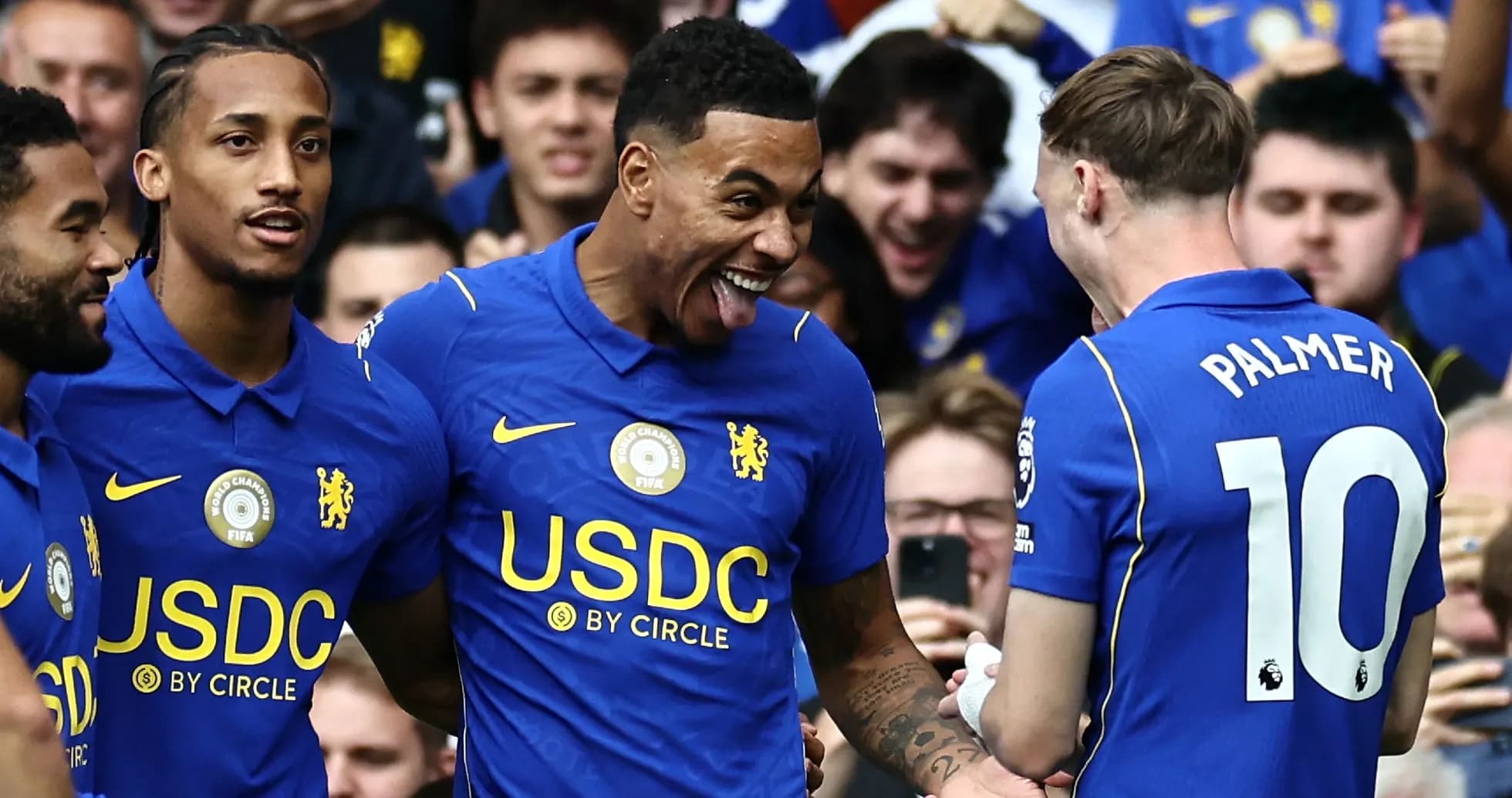 Chelsea players celebrating a goal together Chelsea players celebrating a goal together
