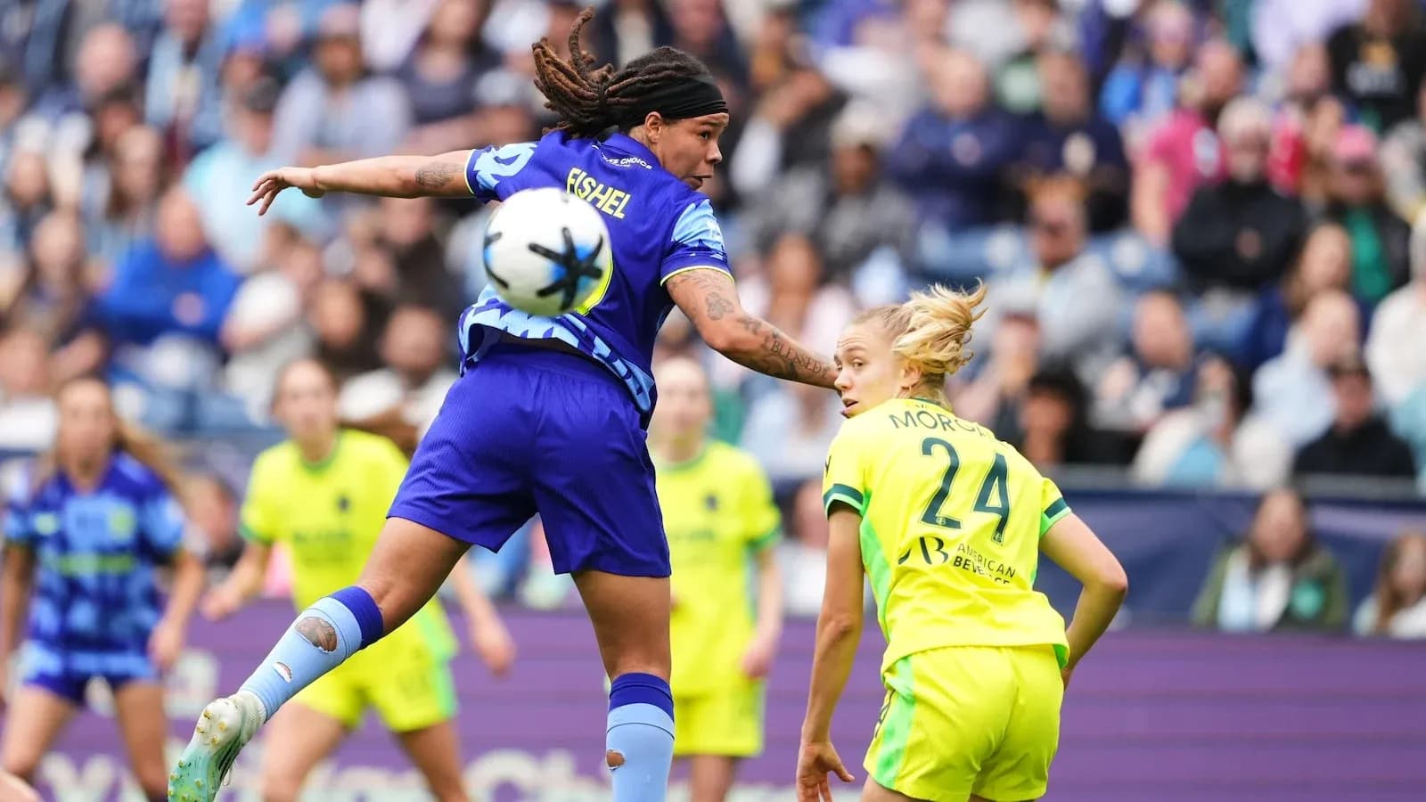 Player competing for the ball during match Player competing for the ball during match