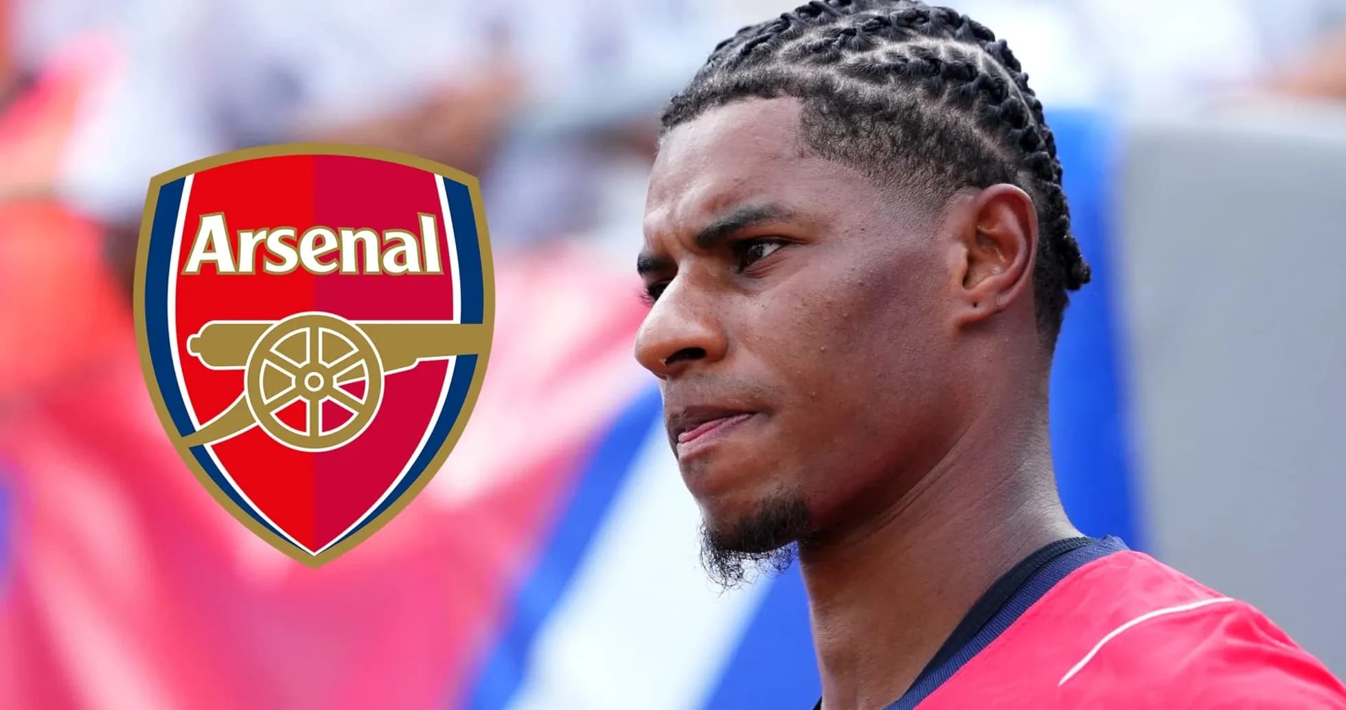 Player in Arsenal kit with logo in background Player in Arsenal kit with logo in background