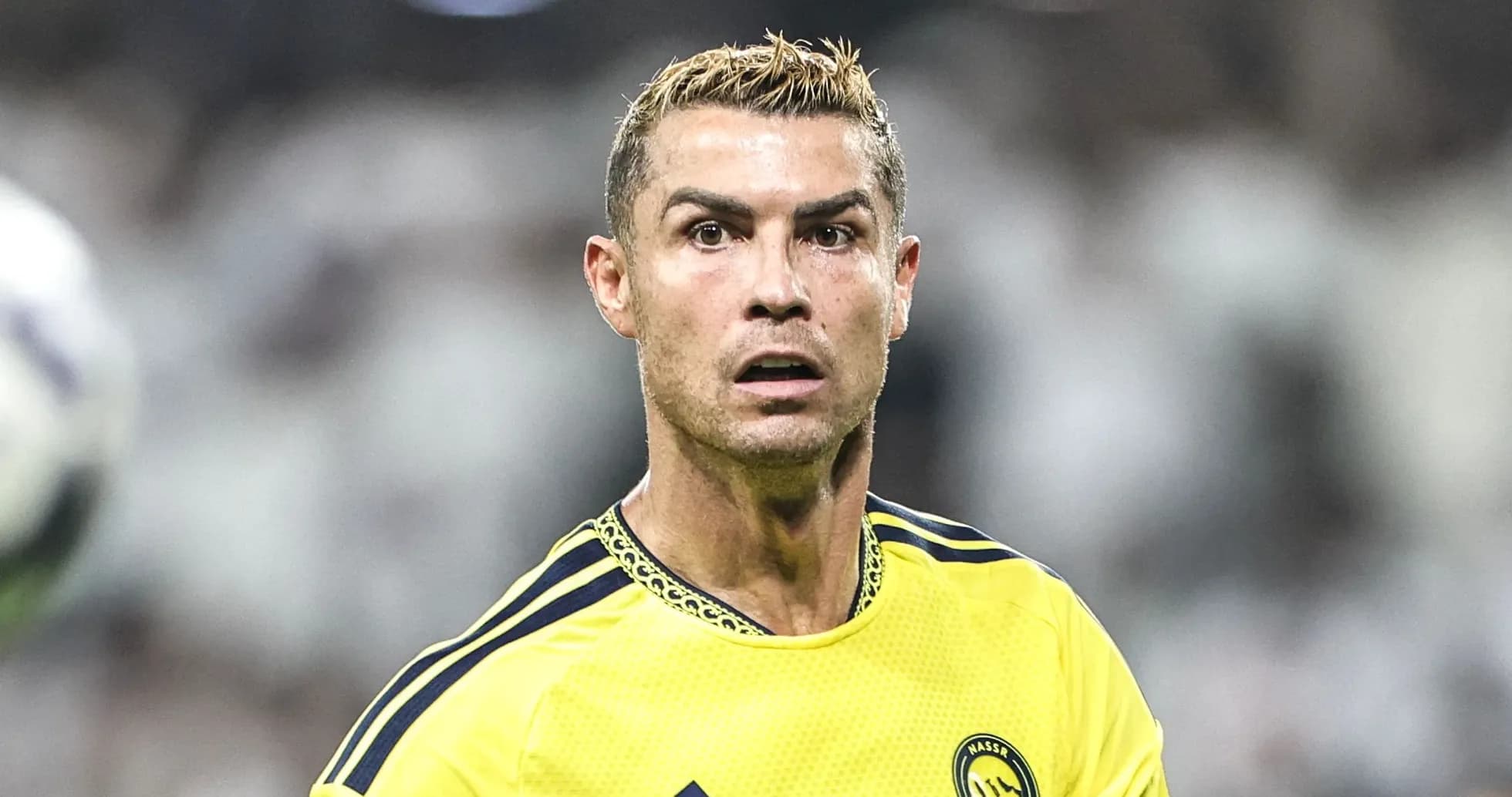 Cristiano Ronaldo in yellow jersey during match Cristiano Ronaldo in yellow jersey during match