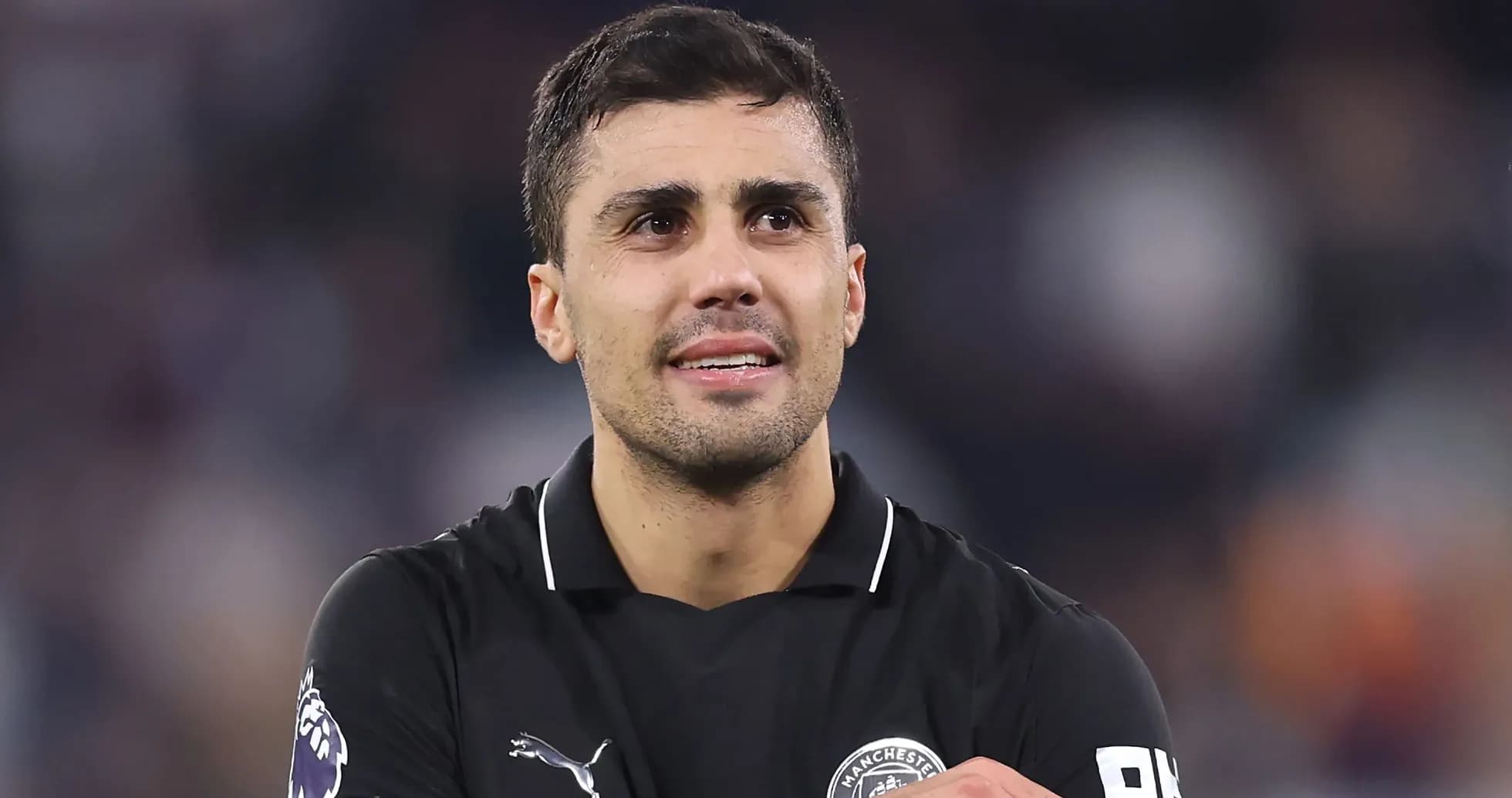 Player in black kit celebrating after match Player in black kit celebrating after match
