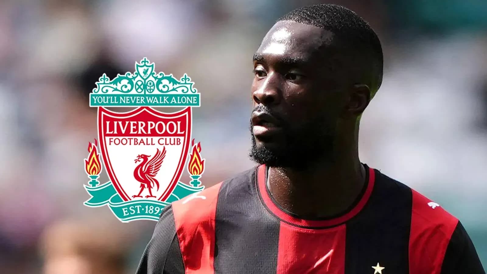 Player in red and black jersey with Liverpool logo Player in red and black jersey with Liverpool logo