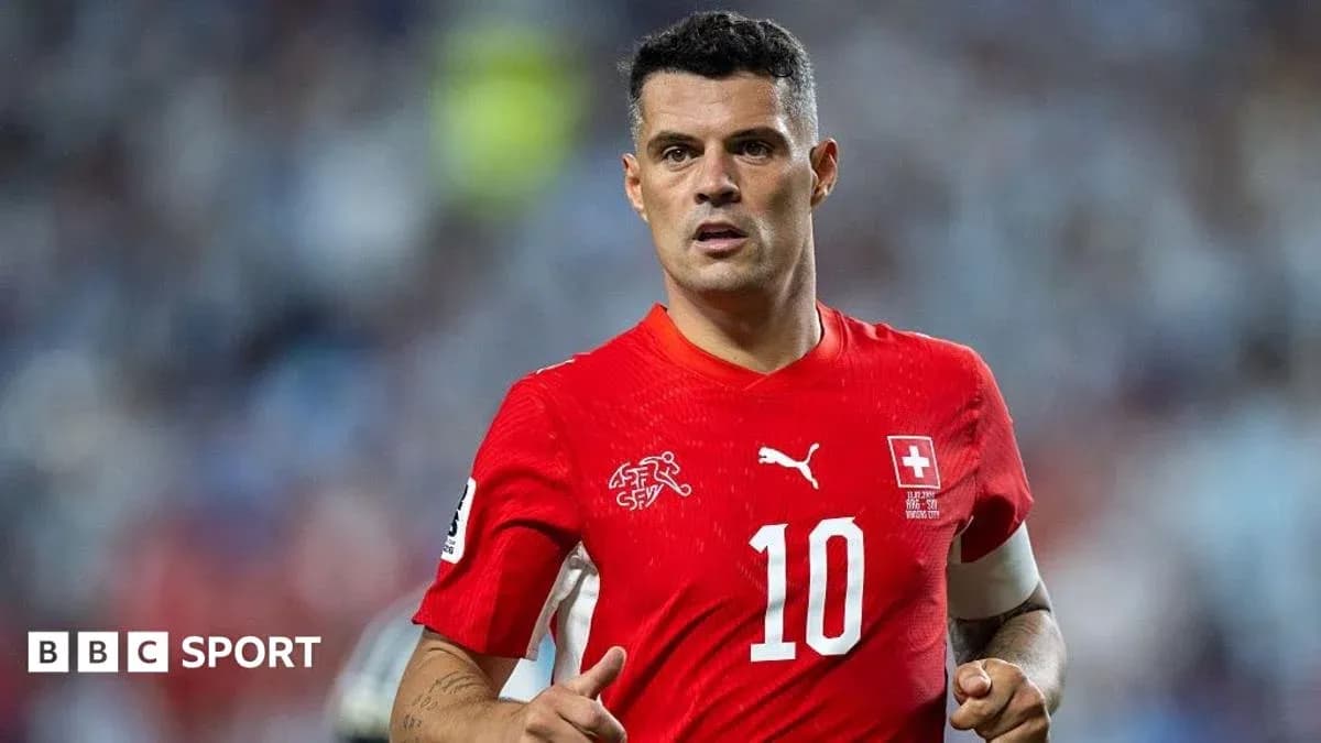 Player wearing red jersey during a match Player wearing red jersey during a match