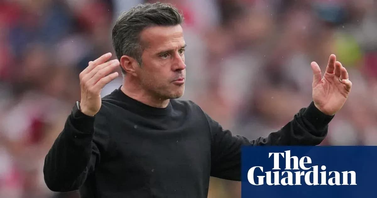 Manager gesturing during a football match Manager gesturing during a football match