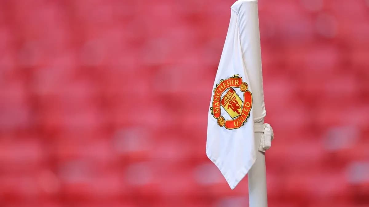 Corner flag with Manchester United logo at stadium Corner flag with Manchester United logo at stadium