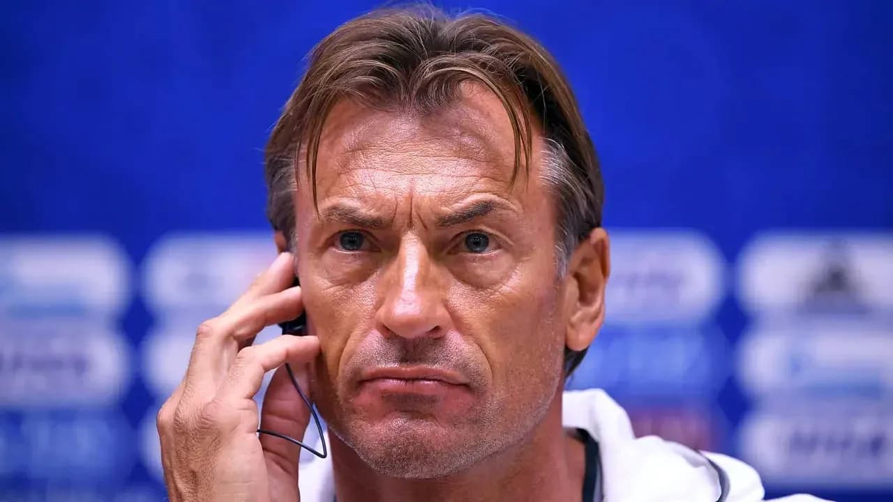 Coach speaking into headset during press conference Coach speaking into headset during press conference