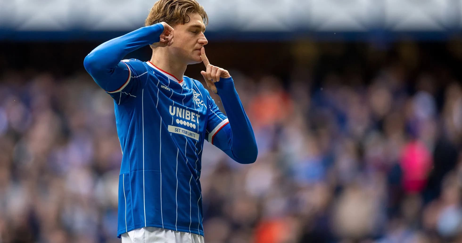 Player shushing crowd after scoring for Rangers Player shushing crowd after scoring for Rangers