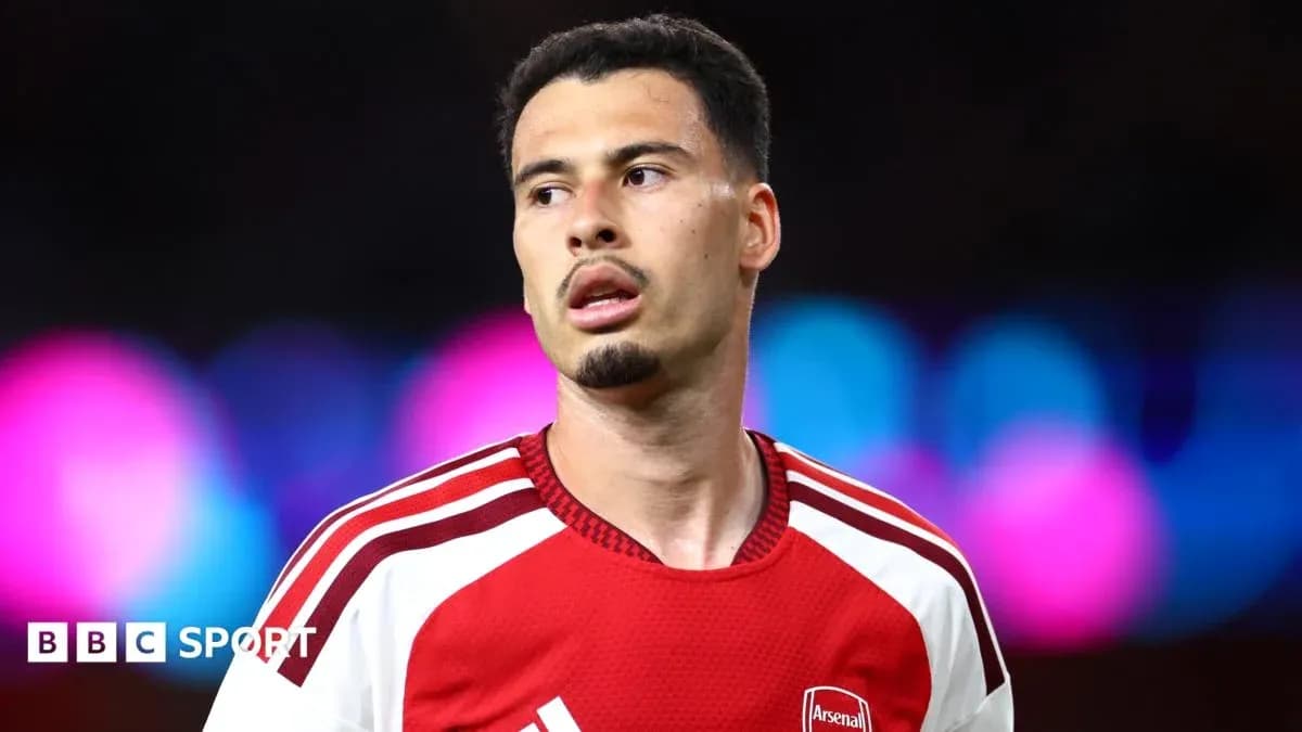 Arsenal player during match, focused on game Arsenal player during match, focused on game