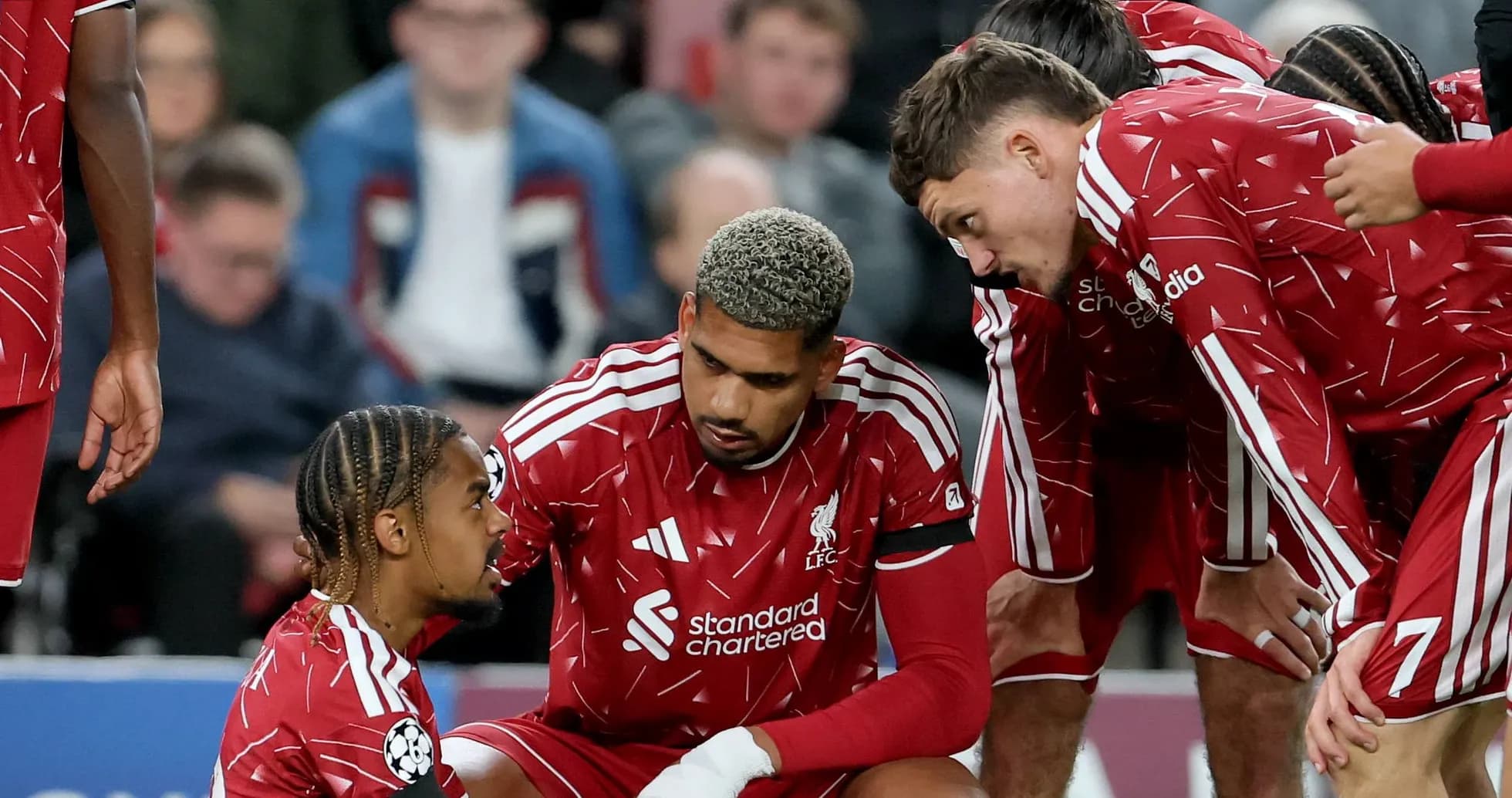 Liverpool players discussing during a match break Liverpool players discussing during a match break