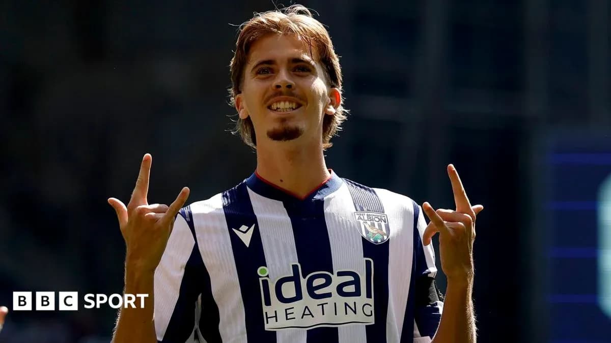 Player celebrating a goal in West Bromwich Albion kit Player celebrating a goal in West Bromwich Albion kit