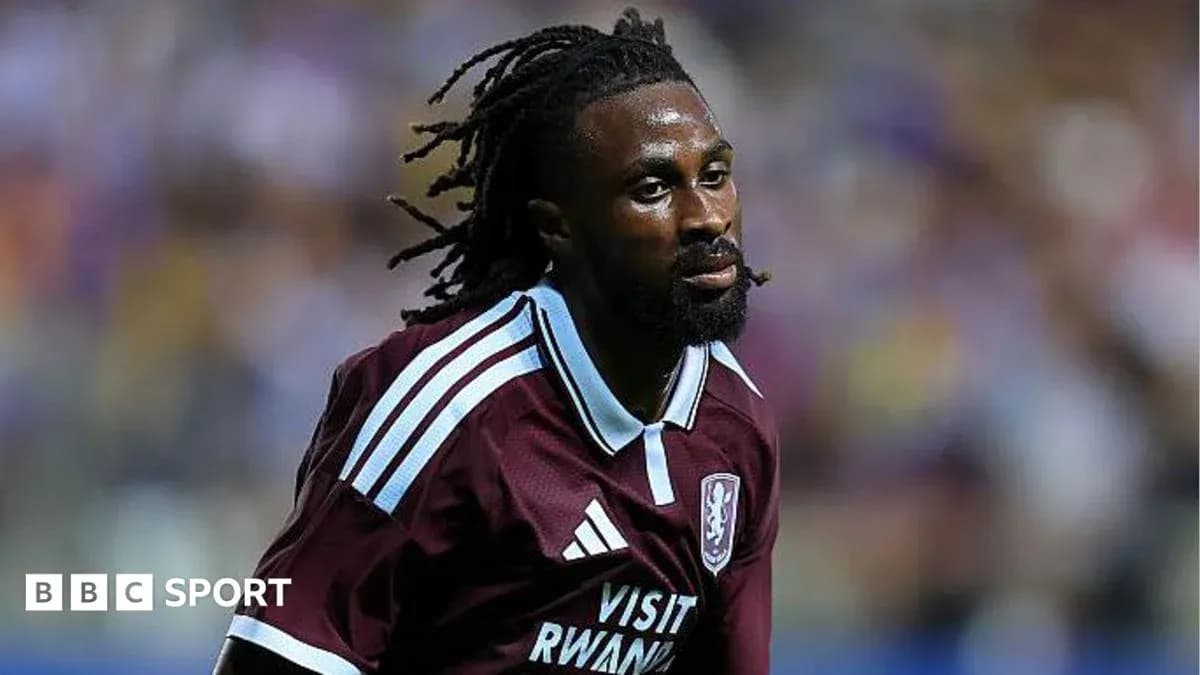 Player in maroon jersey during football match Player in maroon jersey during football match