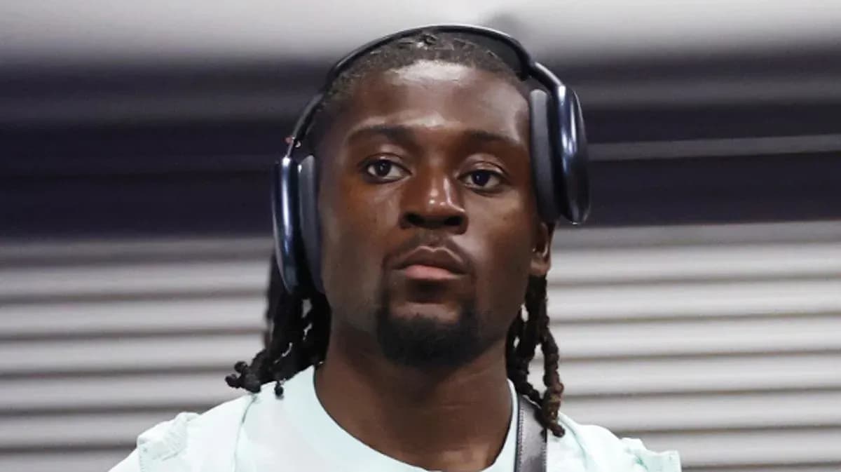 Player wearing headphones in indoor setting Player wearing headphones in indoor setting