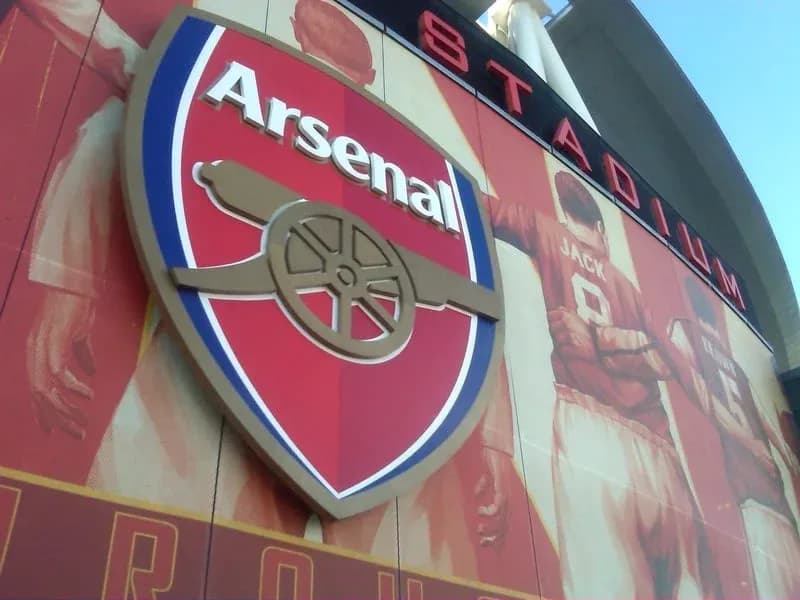 Arsenal FC logo displayed on stadium wall Arsenal FC logo displayed on stadium wall
