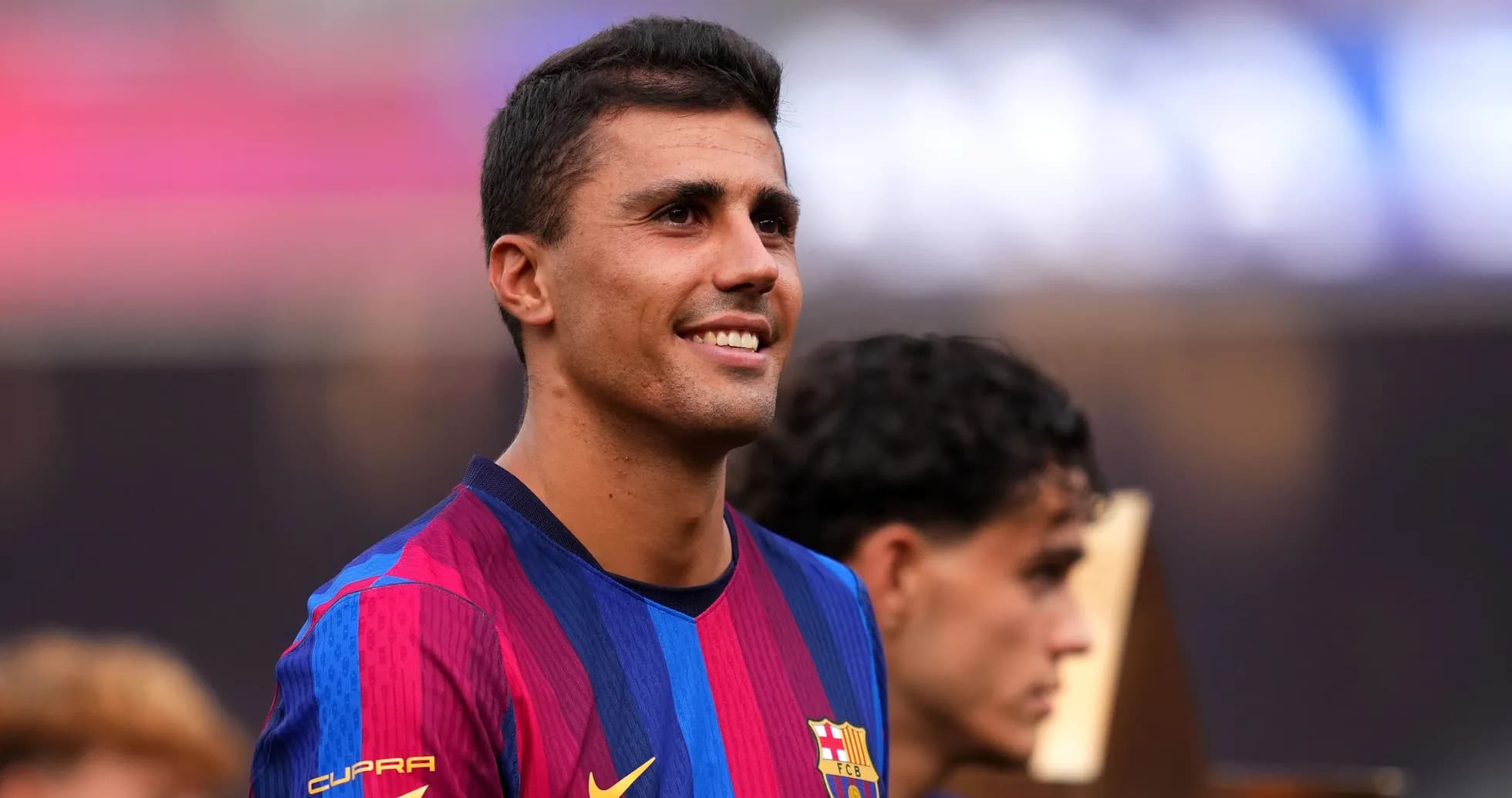 Barcelona player smiling during trophy celebration Barcelona player smiling during trophy celebration