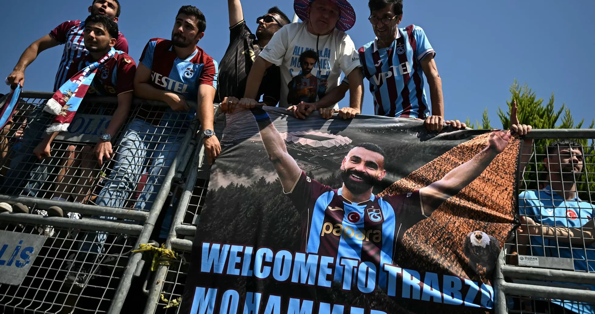 Fans holding welcome banner for Mohammed in Trabzon Fans holding welcome banner for Mohammed in Trabzon