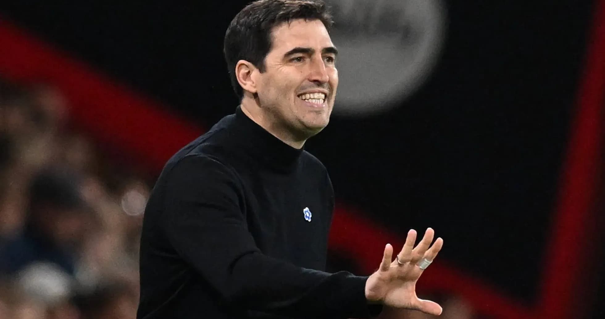 Coach gesturing during a match on the sideline Coach gesturing during a match on the sideline