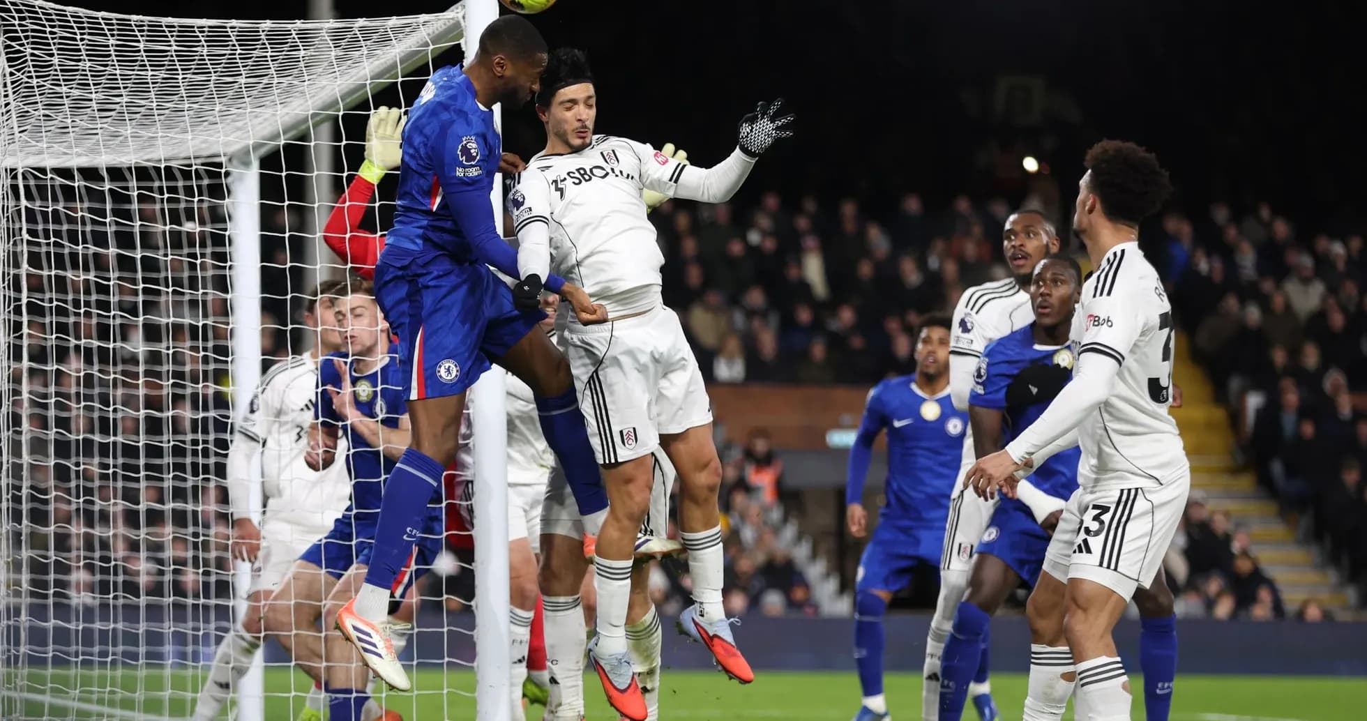 Chelsea player heading the ball during match Chelsea player heading the ball during match
